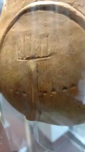 Menorah-like design on a clay vase